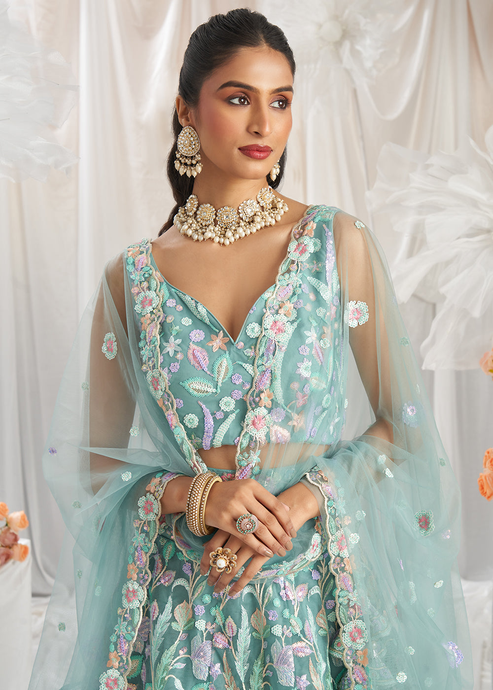 Buy Now Green Net Floral Embroidered Designer Lehenga Choli Online in USA, UK, Canada, UAE, France, Germany & Worldwide at Empress Clothing. 