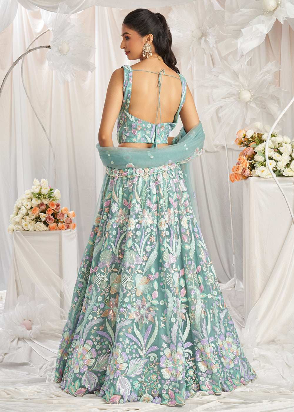 Buy Now Green Net Floral Embroidered Designer Lehenga Choli Online in USA, UK, Canada, UAE, France, Germany & Worldwide at Empress Clothing. 