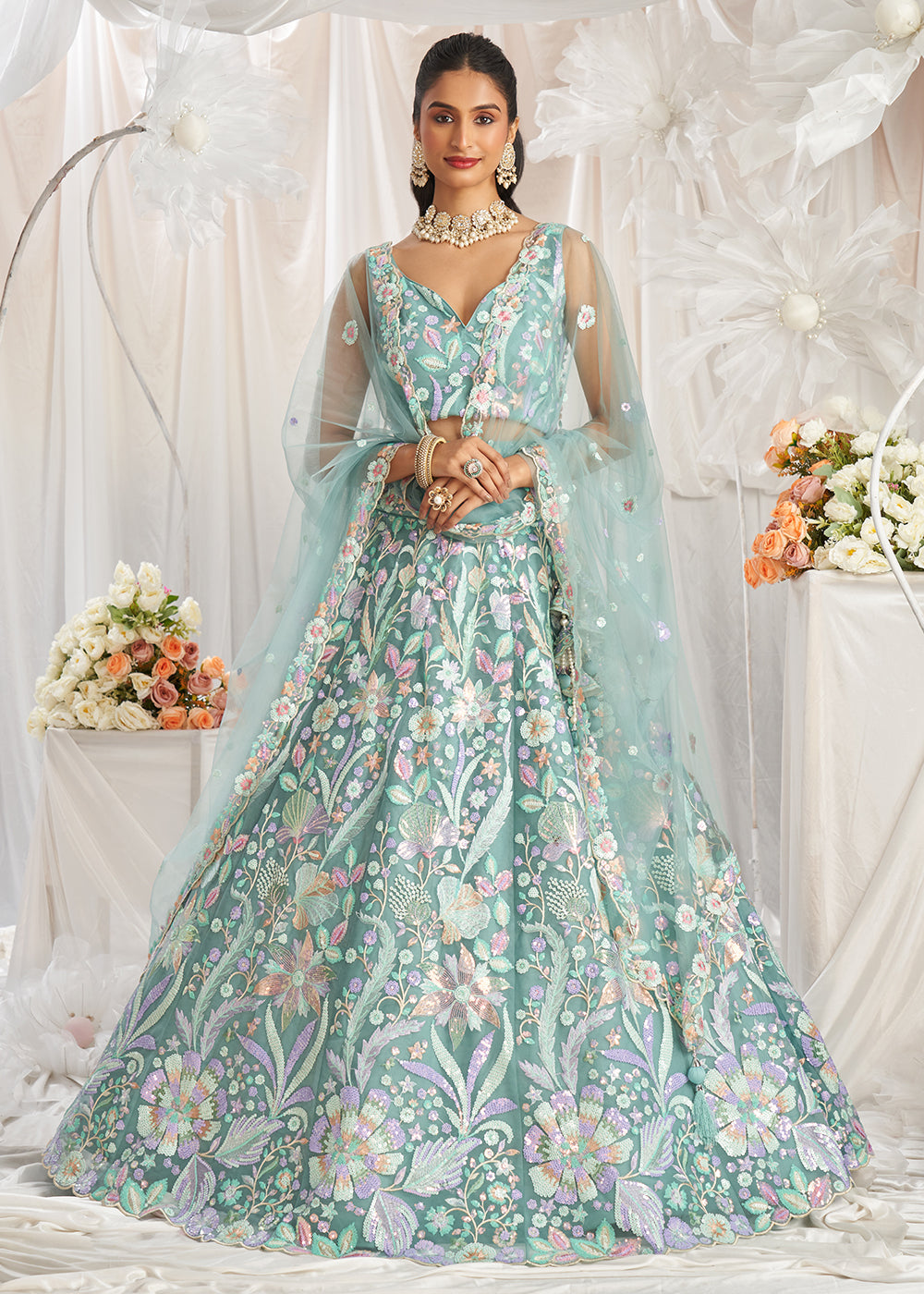 Buy Now Green Net Floral Embroidered Designer Lehenga Choli Online in USA, UK, Canada, UAE, France, Germany & Worldwide at Empress Clothing. 