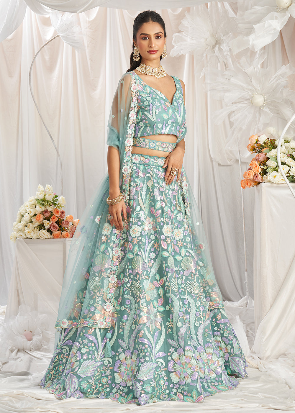 Buy Now Green Net Floral Embroidered Designer Lehenga Choli Online in USA, UK, Canada, UAE, France, Germany & Worldwide at Empress Clothing. 