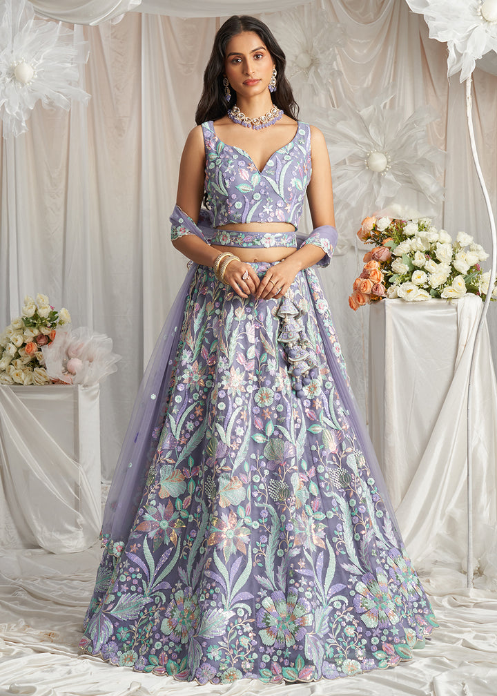 Buy Now Mauve Net Floral Embroidered Designer Lehenga Choli Online in USA, UK, Canada, UAE, France, Germany & Worldwide at Empress Clothing.