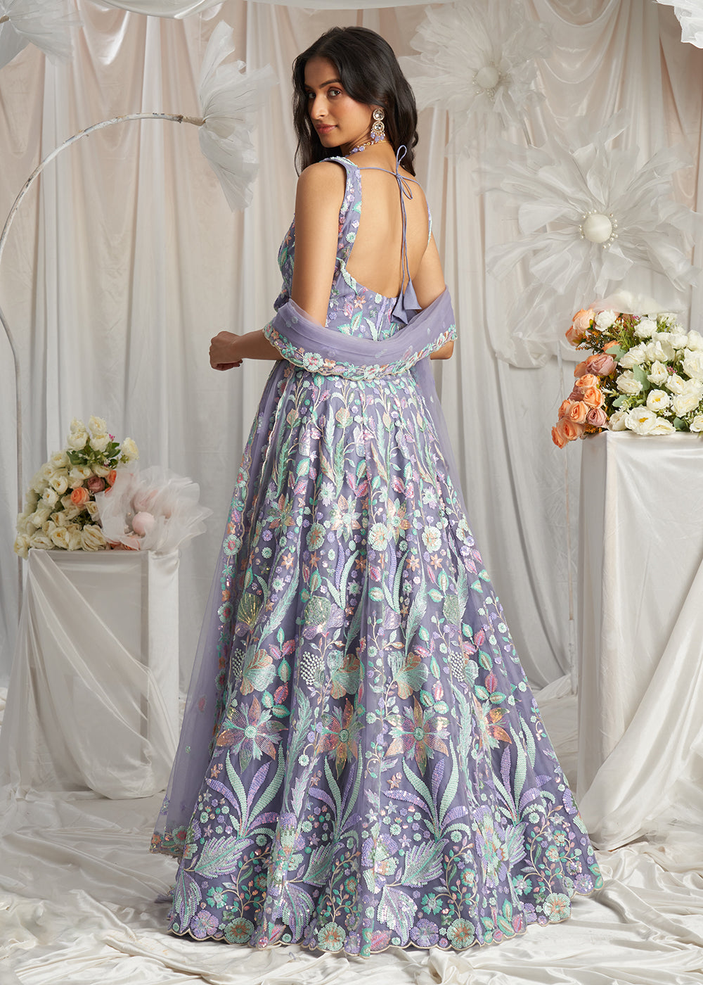 Buy Now Mauve Net Floral Embroidered Designer Lehenga Choli Online in USA, UK, Canada, UAE, France, Germany & Worldwide at Empress Clothing.