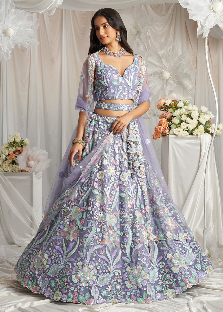 Buy Now Mauve Net Floral Embroidered Designer Lehenga Choli Online in USA, UK, Canada, UAE, France, Germany & Worldwide at Empress Clothing.