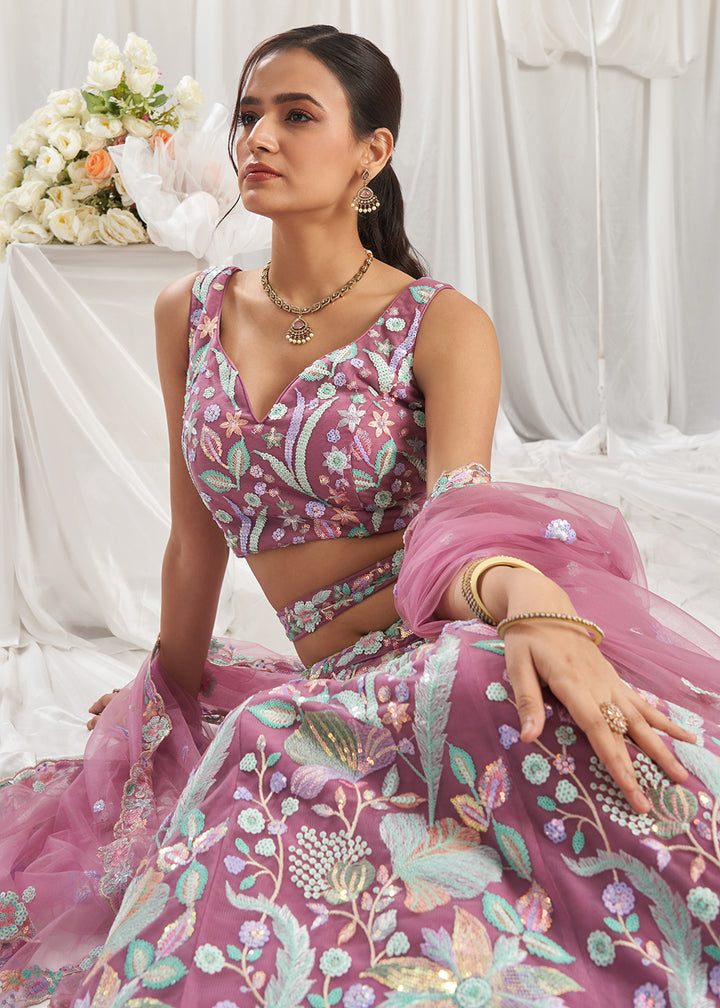 Buy Now Rose Gold Net Floral Embroidered Designer Lehenga Choli Online in USA, UK, Canada, UAE, France, Germany & Worldwide at Empress Clothing.