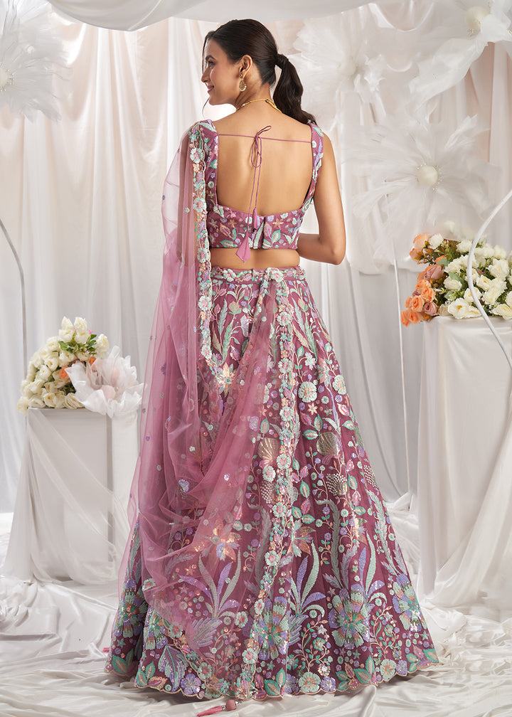 Buy Now Rose Gold Net Floral Embroidered Designer Lehenga Choli Online in USA, UK, Canada, UAE, France, Germany & Worldwide at Empress Clothing.