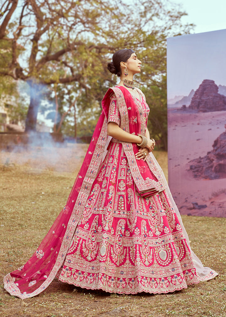 Buy Now Pink Pure Silk Embroidered Wedding Wear Lehenga Choli Online in USA, UK, Canada, UAE, France, Germany & Worldwide at Empress Clothing. 