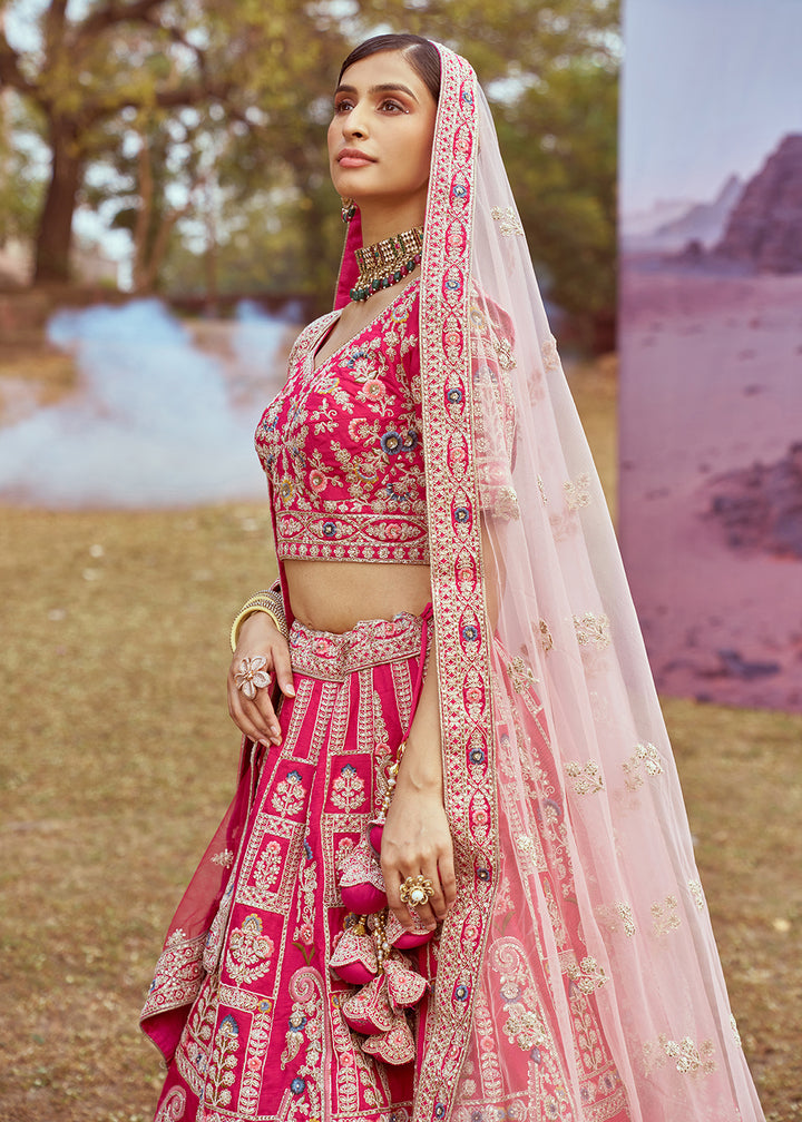 Buy Now Pink Pure Silk Embroidered Wedding Wear Lehenga Choli Online in USA, UK, Canada, UAE, France, Germany & Worldwide at Empress Clothing. 