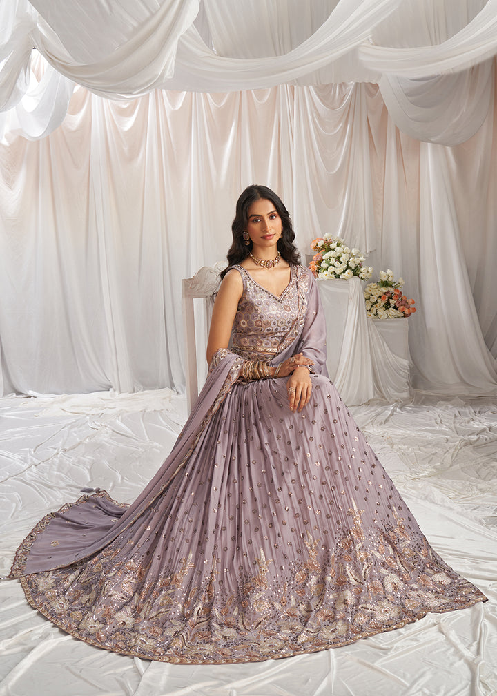 Buy Now Mauve Georgette Cording Threads Embroidered Lehenga Choli Online in USA, UK, Canada, UAE, France, Germany & Worldwide at Empress Clothing. 