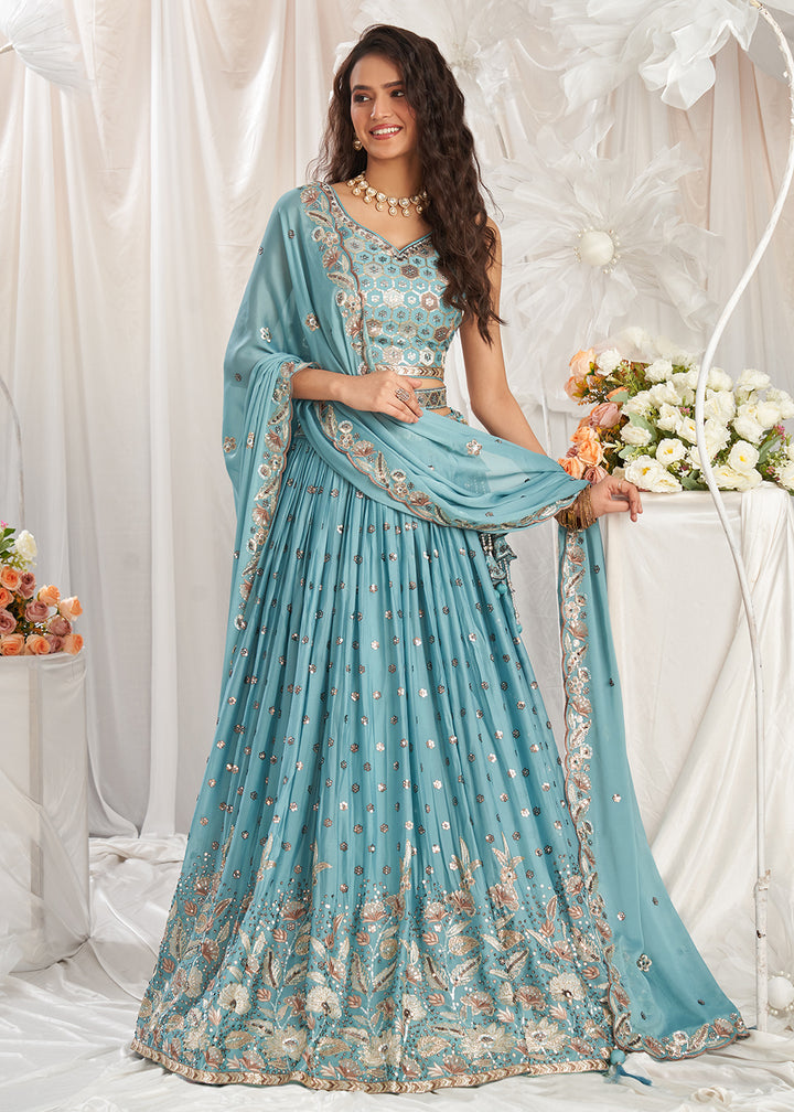 Buy Now Turquoise Georgette Cording Threads Embroidered Lehenga Choli Online in USA, UK, Canada, UAE, France, Germany & Worldwide at Empress Clothing. 