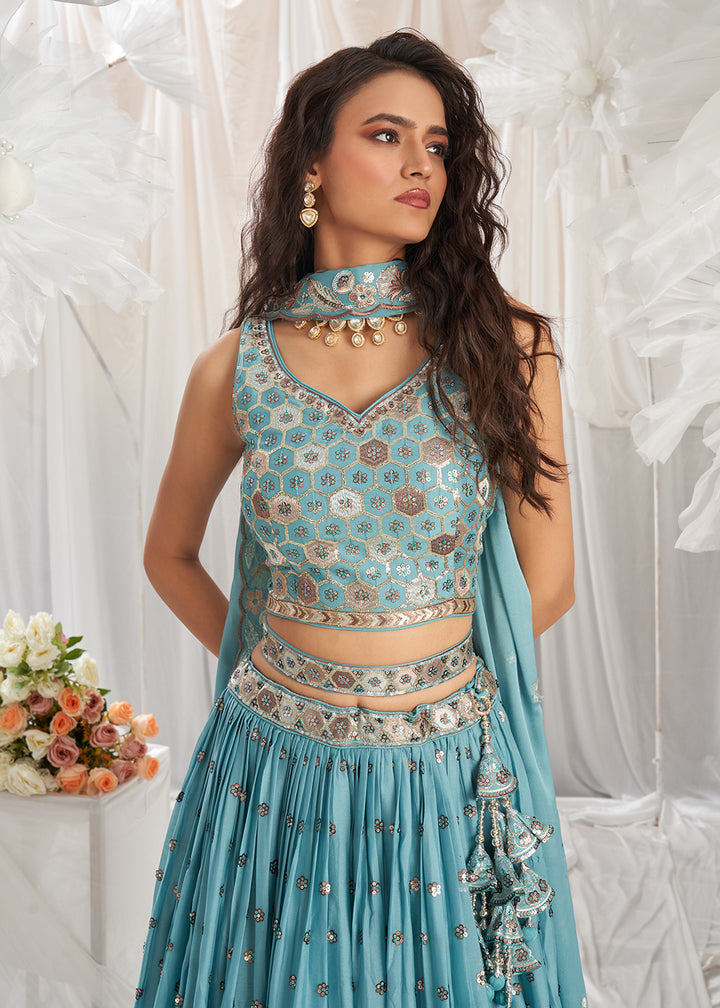 Buy Now Turquoise Georgette Cording Threads Embroidered Lehenga Choli Online in USA, UK, Canada, UAE, France, Germany & Worldwide at Empress Clothing. 