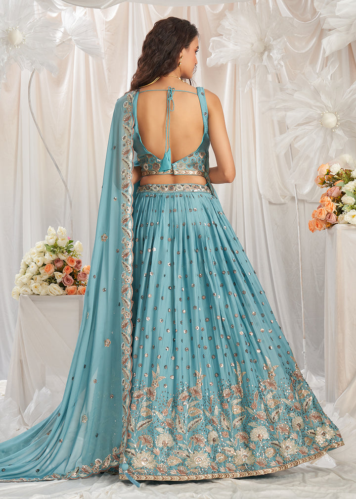 Buy Now Turquoise Georgette Cording Threads Embroidered Lehenga Choli Online in USA, UK, Canada, UAE, France, Germany & Worldwide at Empress Clothing. 