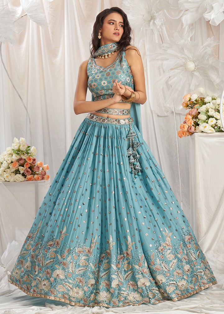 Buy Now Turquoise Georgette Cording Threads Embroidered Lehenga Choli Online in USA, UK, Canada, UAE, France, Germany & Worldwide at Empress Clothing. 