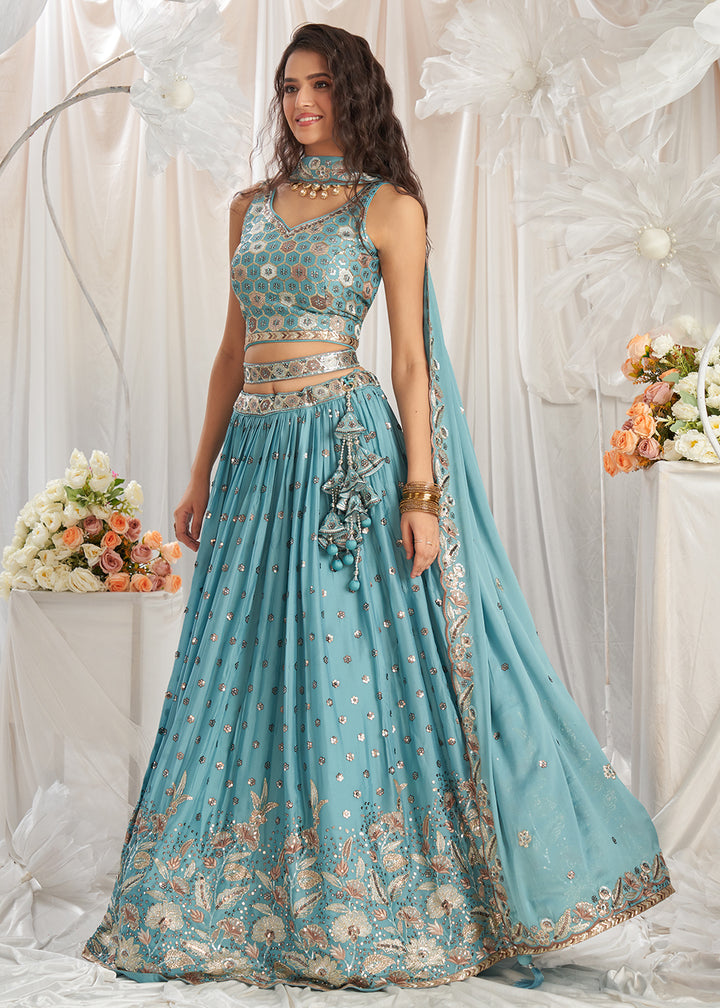 Buy Now Turquoise Georgette Cording Threads Embroidered Lehenga Choli Online in USA, UK, Canada, UAE, France, Germany & Worldwide at Empress Clothing. 