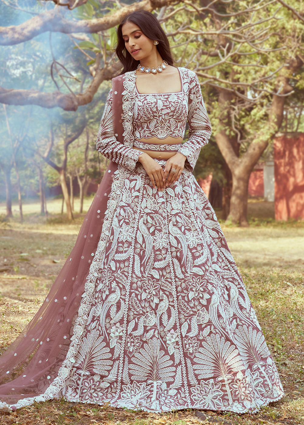 Buy Now Rose Gold Satin Sequins Embroidered Designer Lehenga Choli Online in USA, UK, Canada, UAE, France, Germany & Worldwide at Empress Clothing.