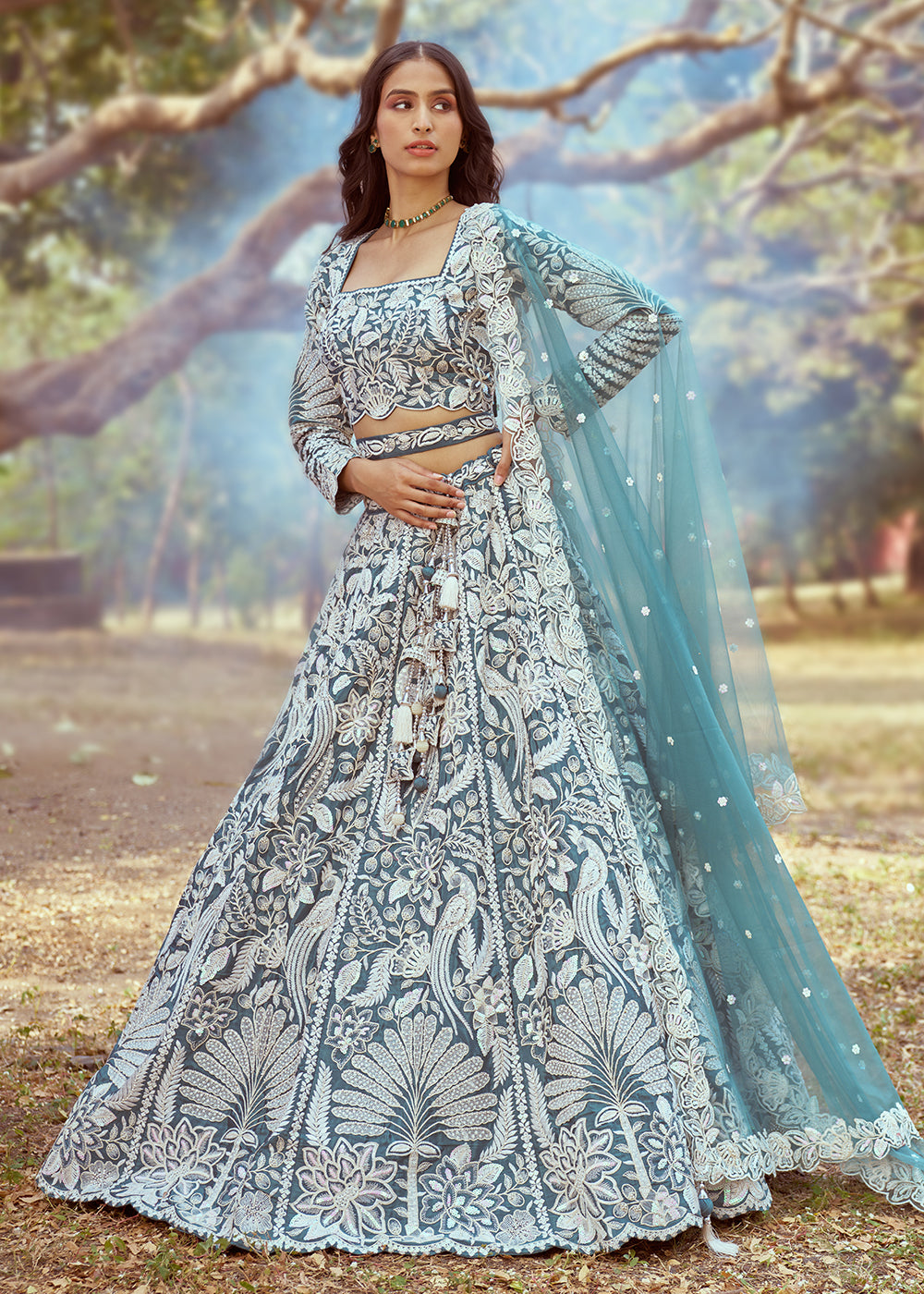 Buy Now Teal Satin Sequins Embroidered Designer Lehenga Choli Online in USA, UK, Canada, UAE, France, Germany & Worldwide at Empress Clothing. 