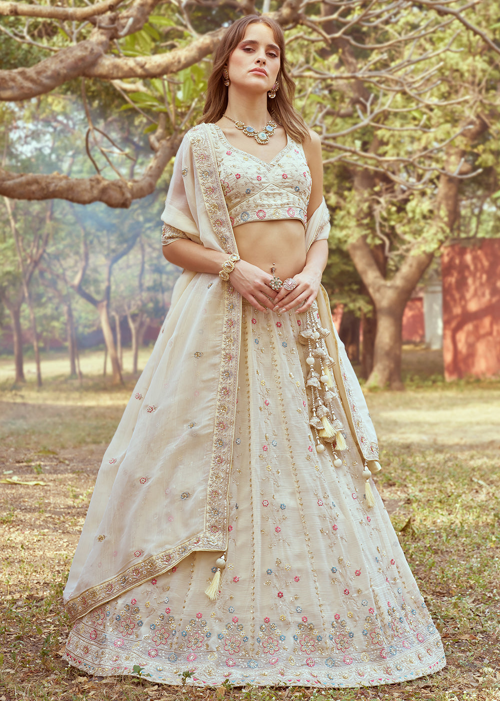 Buy Now Cream Hand Work Embroidered Wedding Lehenga Choli Online in USA, UK, Canada, UAE, France, Germany & Worldwide at Empress Clothing. 