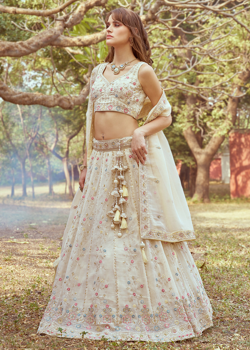 Buy Now Cream Hand Work Embroidered Wedding Lehenga Choli Online in USA, UK, Canada, UAE, France, Germany & Worldwide at Empress Clothing. 