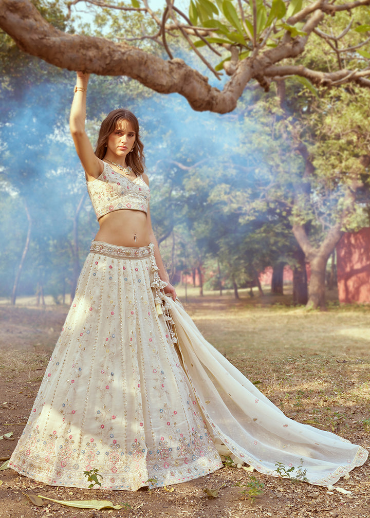 Buy Now Cream Hand Work Embroidered Wedding Lehenga Choli Online in USA, UK, Canada, UAE, France, Germany & Worldwide at Empress Clothing. 