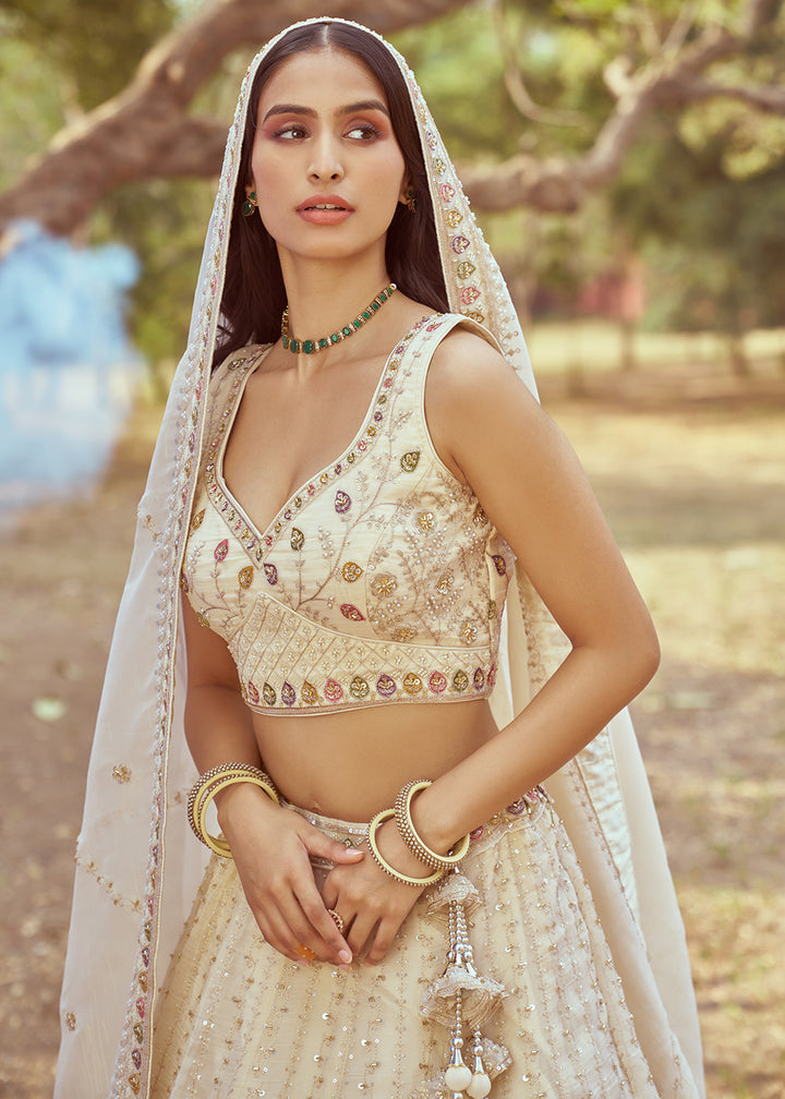 Buy Now Hand Work Embroidered Cream Wedding Lehenga Choli Online in USA, UK, Canada, UAE, France, Germany & Worldwide at Empress Clothing. 