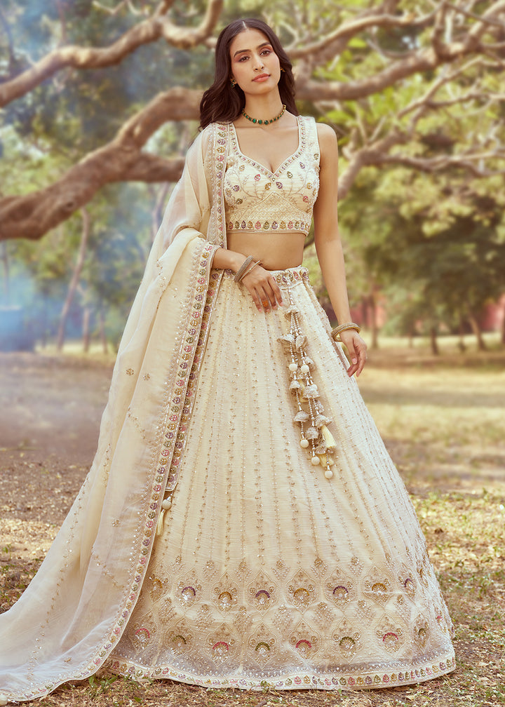 Buy Now Hand Work Embroidered Cream Wedding Lehenga Choli Online in USA, UK, Canada, UAE, France, Germany & Worldwide at Empress Clothing. 