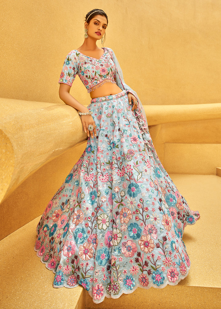 Buy Now Zarkan & Sequins Embroidered Turquoise Designer Lehenga Choli Online in USA, UK, Canada, UAE, France, Germany & Worldwide at Empress Clothing.