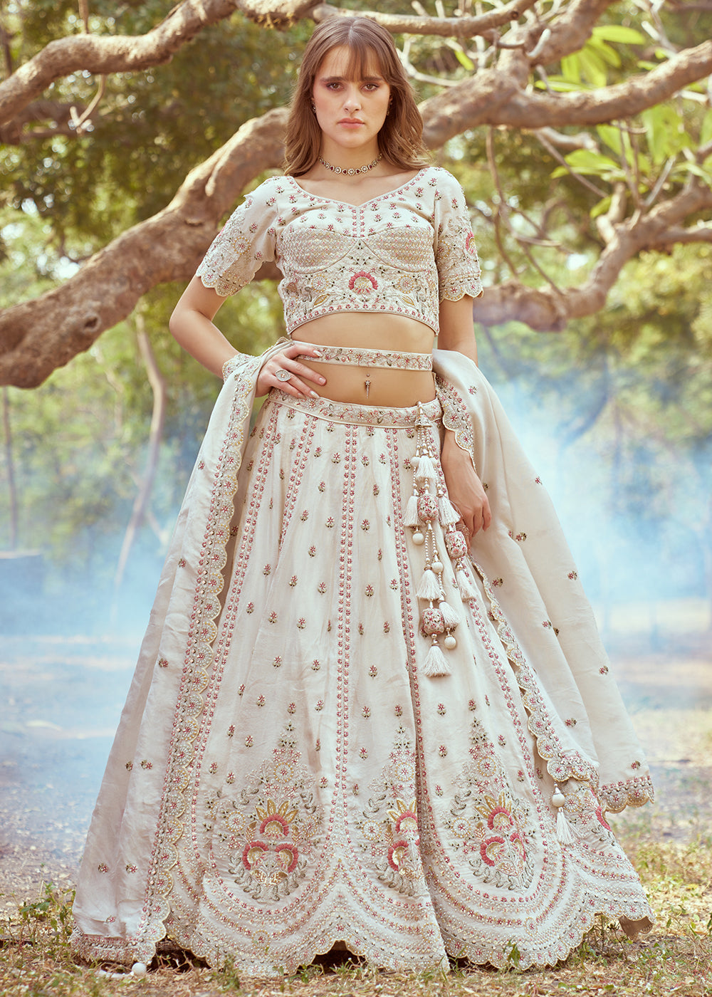 Buy Now Cream Gold Crushed Tissue Designer Lehenga Choli Online in USA, UK, Canada, UAE, France, Germany & Worldwide at Empress Clothing. 