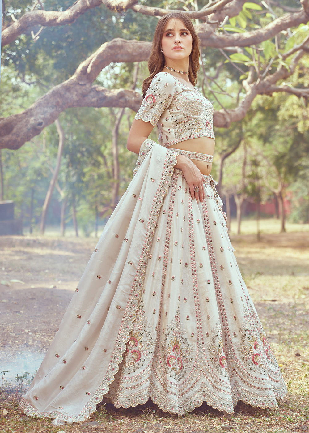 Buy Now Cream Gold Crushed Tissue Designer Lehenga Choli Online in USA, UK, Canada, UAE, France, Germany & Worldwide at Empress Clothing. 