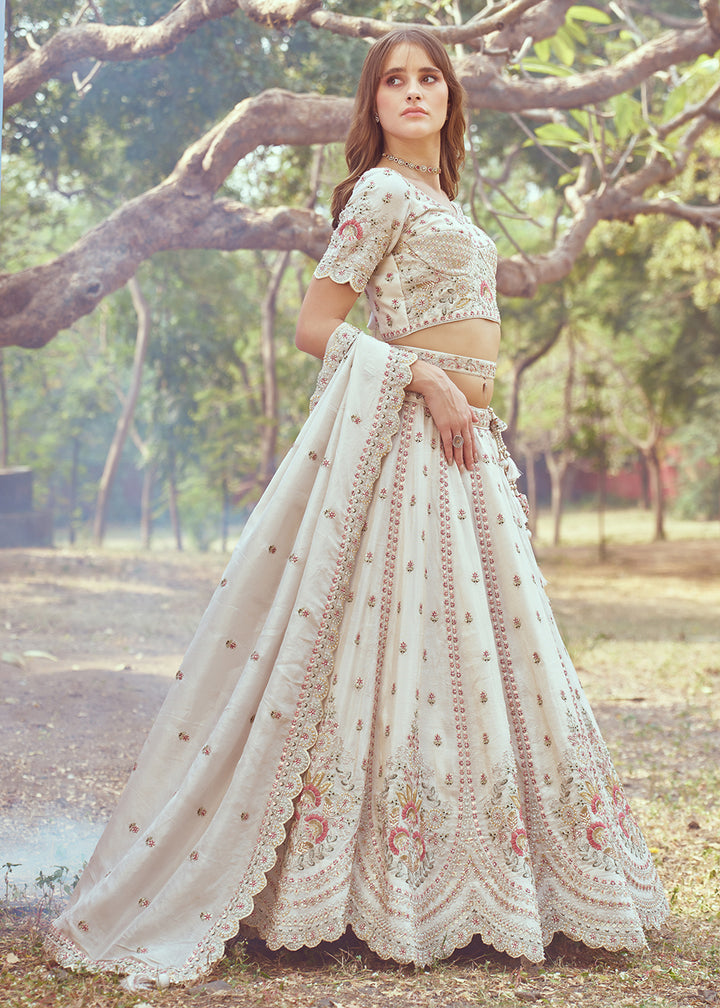 Buy Now Cream Gold Crushed Tissue Designer Lehenga Choli Online in USA, UK, Canada, UAE, France, Germany & Worldwide at Empress Clothing. 