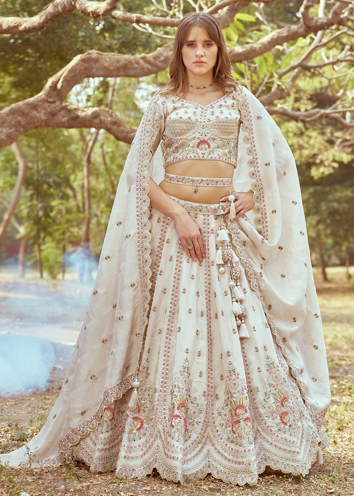 Buy Now Cream Gold Crushed Tissue Designer Lehenga Choli Online in USA, UK, Canada, UAE, France, Germany & Worldwide at Empress Clothing. 