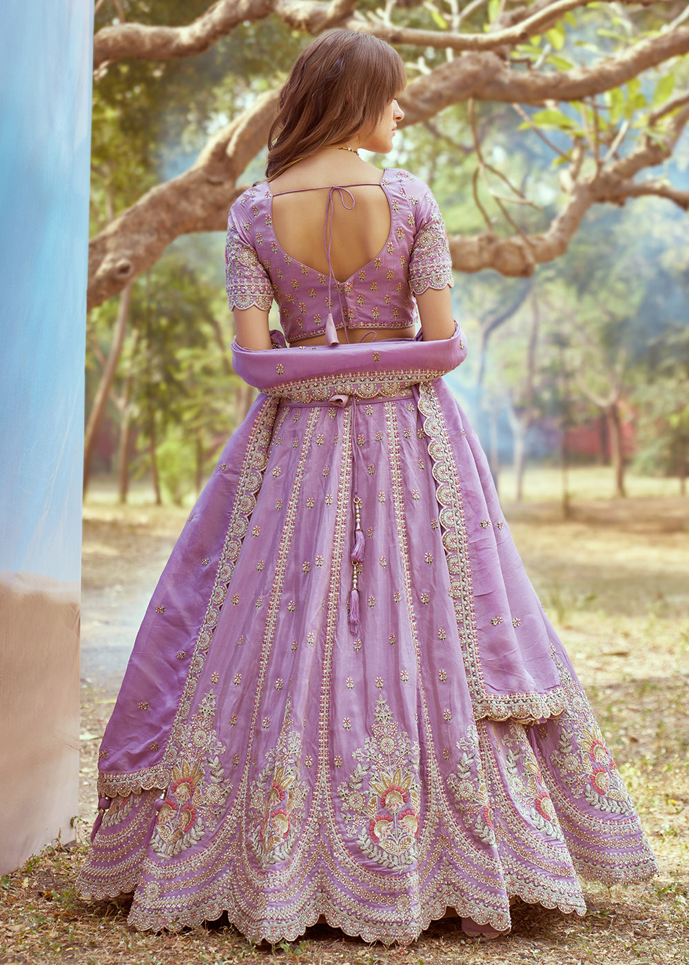 Buy Now Lavender Crushed Tissue Designer Lehenga Choli Online in USA, UK, Canada, UAE, France, Germany & Worldwide at Empress Clothing.