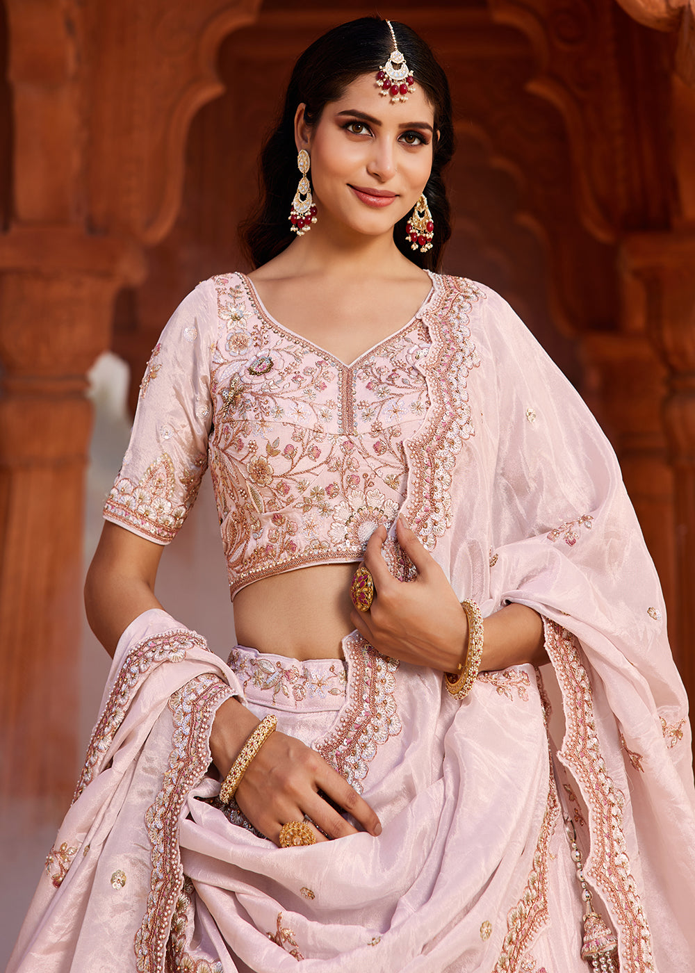 Buy Now Designer Coral Pink Embroidered Bridal Lehenga Choli Online in USA, UK, Canada, France, Italy, Austria, UAE & Worldwide at Empress Clothing.