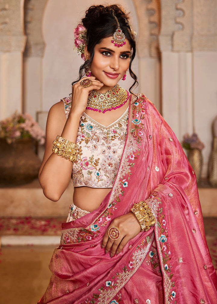 Buy Now Cream & Pink Heavy Embroidered Wedding Lehenga Choli Online in USA, UK, Canada, France, Italy, Germany, Austria, UAE & Worldwide at Empress Clothing.