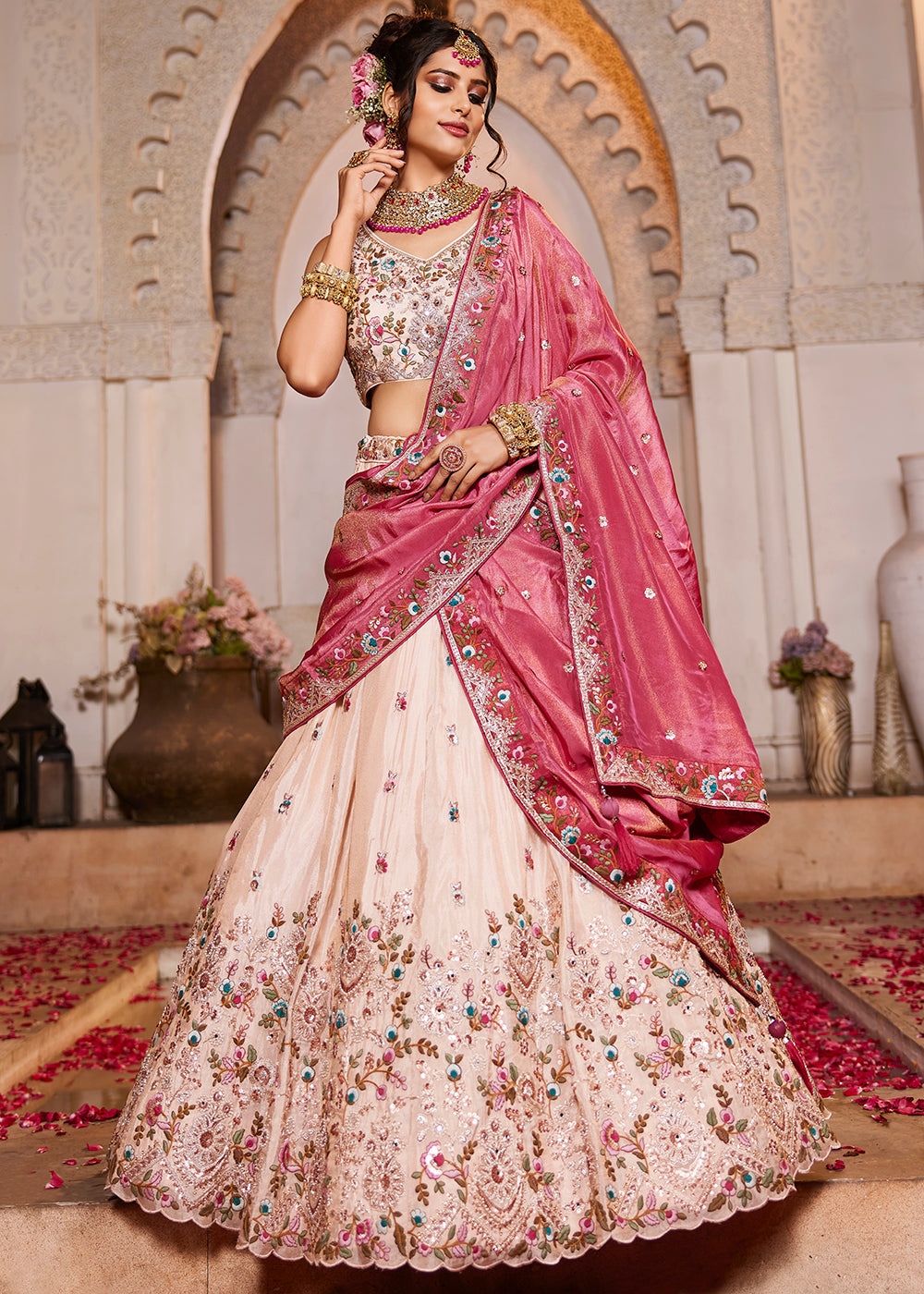 Buy Now Cream & Pink Heavy Embroidered Wedding Lehenga Choli Online in USA, UK, Canada, France, Italy, Germany, Austria, UAE & Worldwide at Empress Clothing.