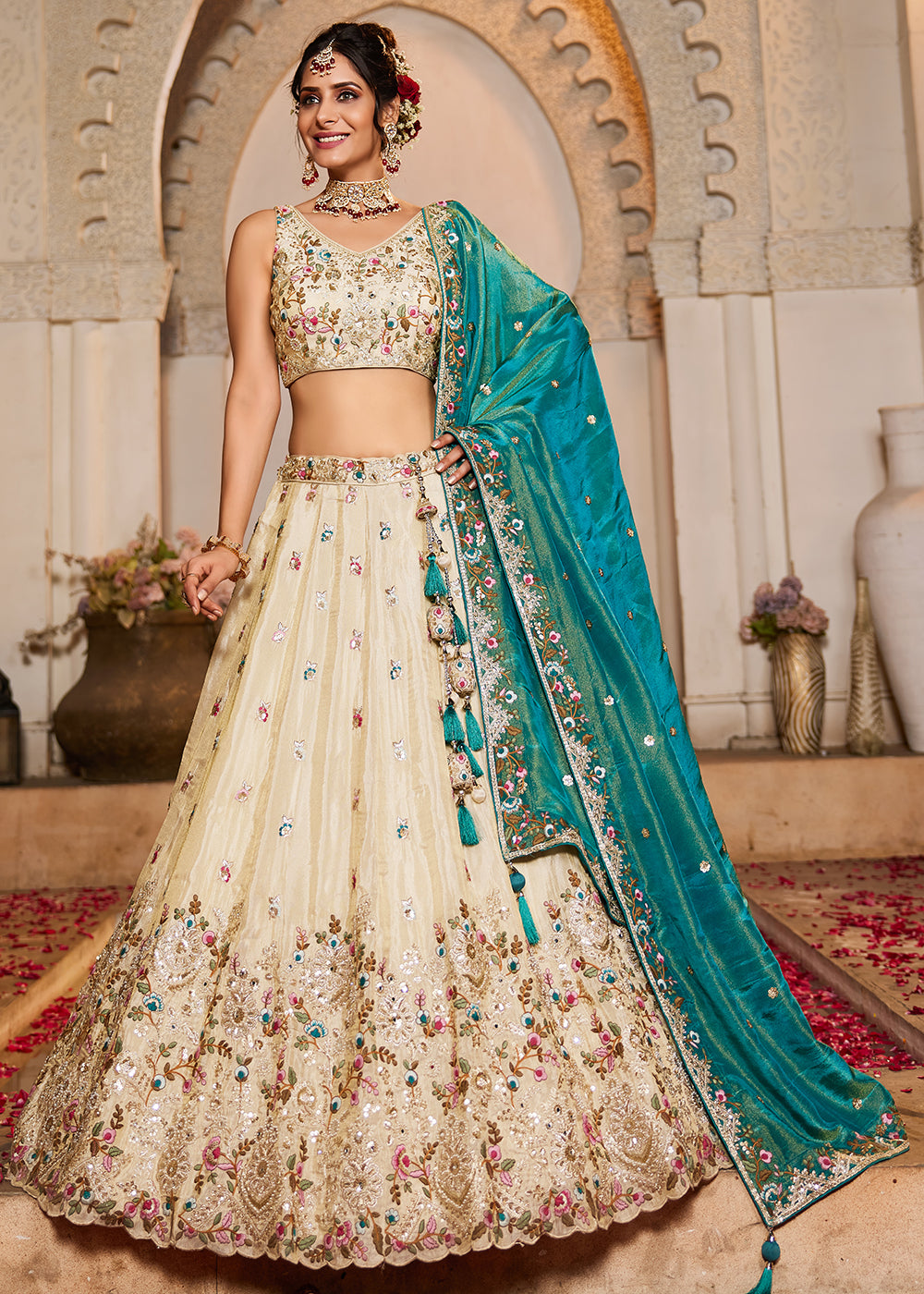 Buy Now Cream & Teal Heavy Embroidered Wedding Lehenga Choli Online in USA, UK, Canada, France, Italy, Germany, Austria, UAE & Worldwide at Empress Clothing.