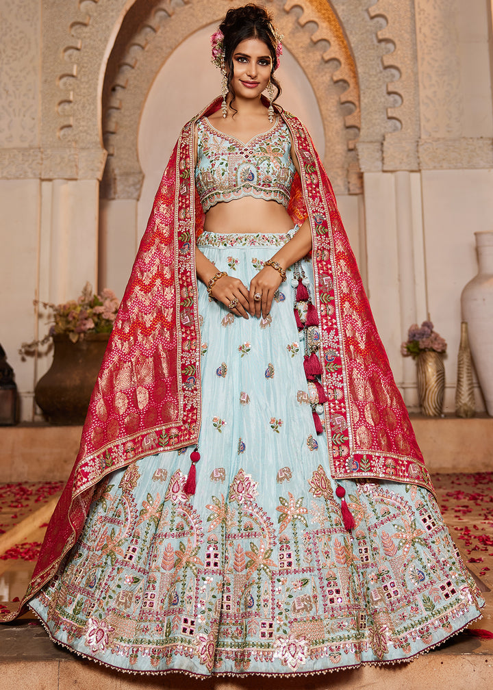 Buy Now Blue Tissue Mirror Embroidered Designer Lehenga Choli Online in USA, UK, Canada, France, Italy, Germany, Austria, UAE & Worldwide at Empress Clothing.