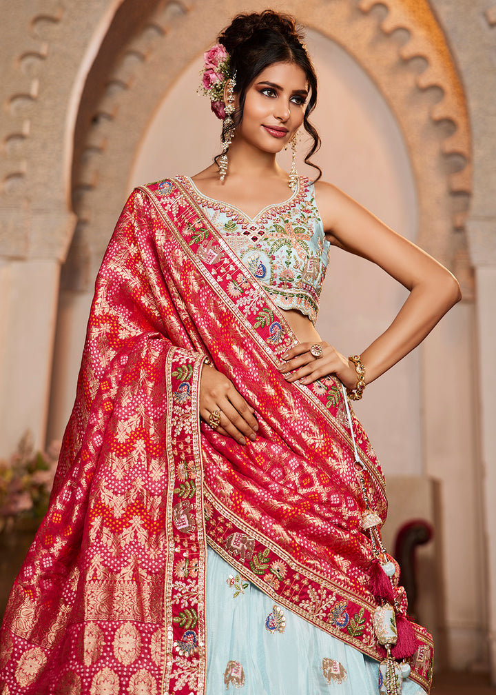 Buy Now Blue Tissue Mirror Embroidered Designer Lehenga Choli Online in USA, UK, Canada, France, Italy, Germany, Austria, UAE & Worldwide at Empress Clothing.