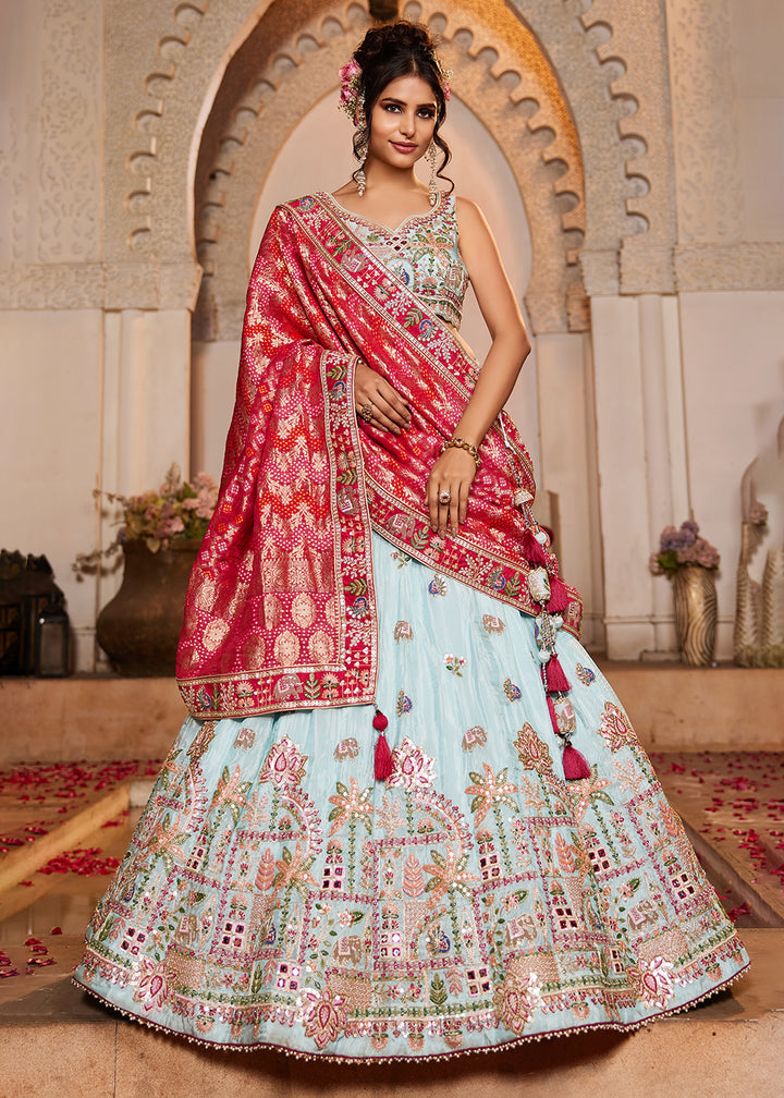 Buy Now Blue Tissue Mirror Embroidered Designer Lehenga Choli Online in USA, UK, Canada, France, Italy, Germany, Austria, UAE & Worldwide at Empress Clothing.