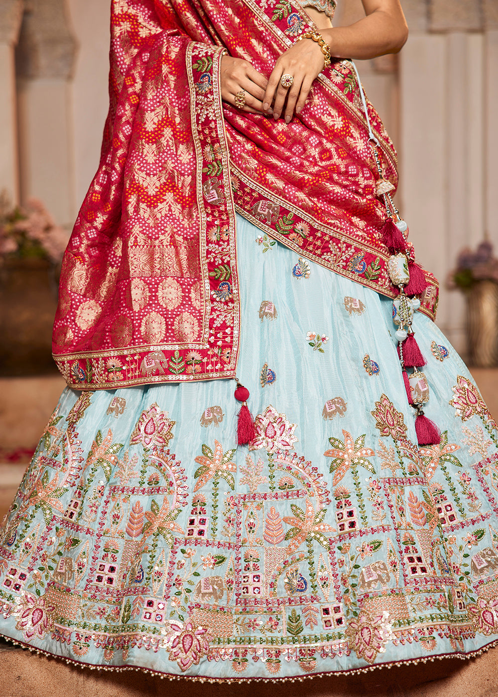 Buy Now Blue Tissue Mirror Embroidered Designer Lehenga Choli Online in USA, UK, Canada, France, Italy, Germany, Austria, UAE & Worldwide at Empress Clothing.