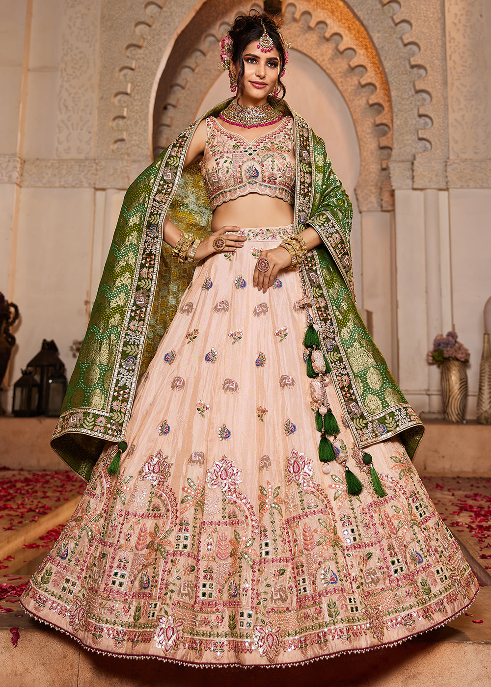Buy Now Peach Tissue Mirror Embroidered Designer Lehenga Choli Online in USA, UK, Canada, France, Italy, Germany, Austria, UAE & Worldwide at Empress Clothing.