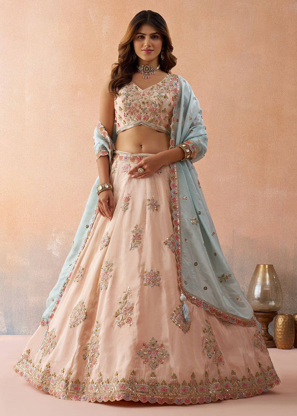 Buy Now Peach Tissue Sequins & Zari Embroidery Lehenga Choli Online in US, UK, Canada, France, Italy, Germany, Sweden, Denmark, UAE & Worldwide at Empress.