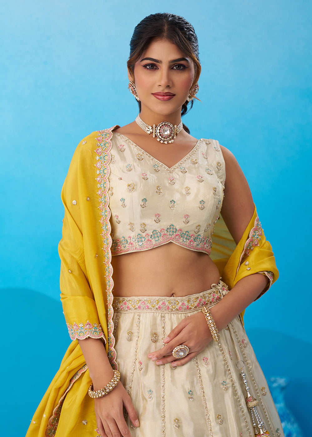 Buy Now Cream Premium Tissue Lehenga Choli with Mustard Dupatta Online in US, UK, Canada, France, Italy, Germany, Sweden, Denmark, UAE & Worldwide at Empress.