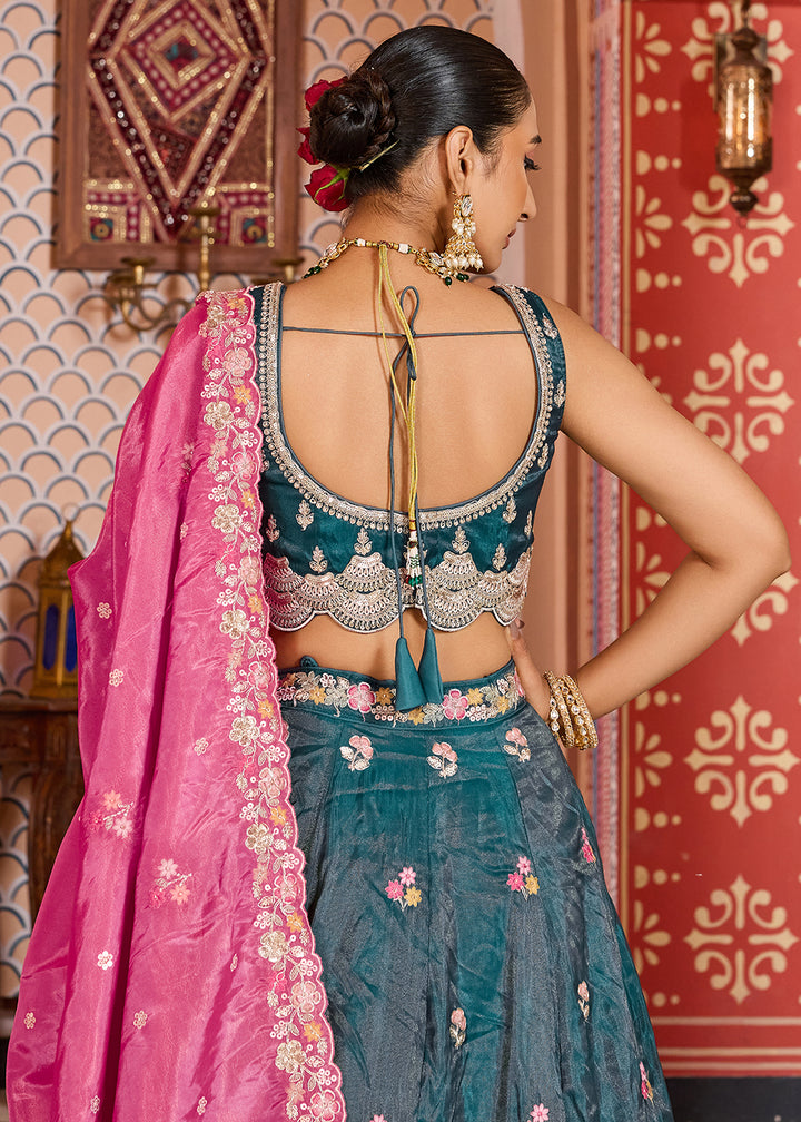 Buy Now Teal Tissue Embroidered Lehenga Choli with Pink Dupatta Online in US, UK, Canada, France, Italy, Germany, Sweden, Greece, UAE & Worldwide at Empress.