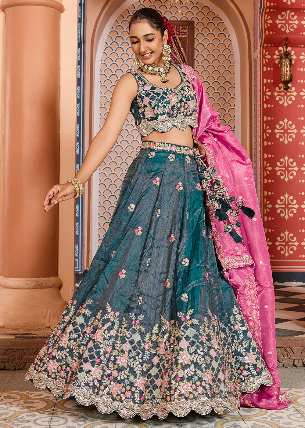 Buy Now Teal Tissue Embroidered Lehenga Choli with Pink Dupatta Online in US, UK, Canada, France, Italy, Germany, Sweden, Greece, UAE & Worldwide at Empress.
