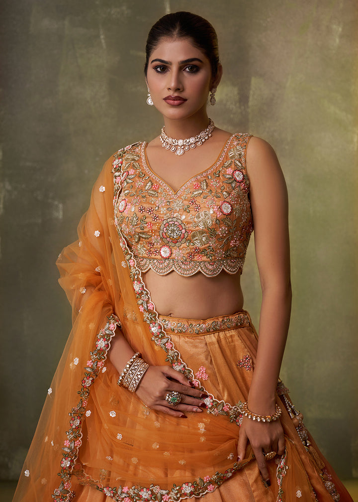 Buy Now Orange Heavy Tissue Pre Wedding Party Lehenga Choli Online in US, UK, Canada, France, Germany, Sweden, Greece, UAE, Denmark & Worldwide at Empress.