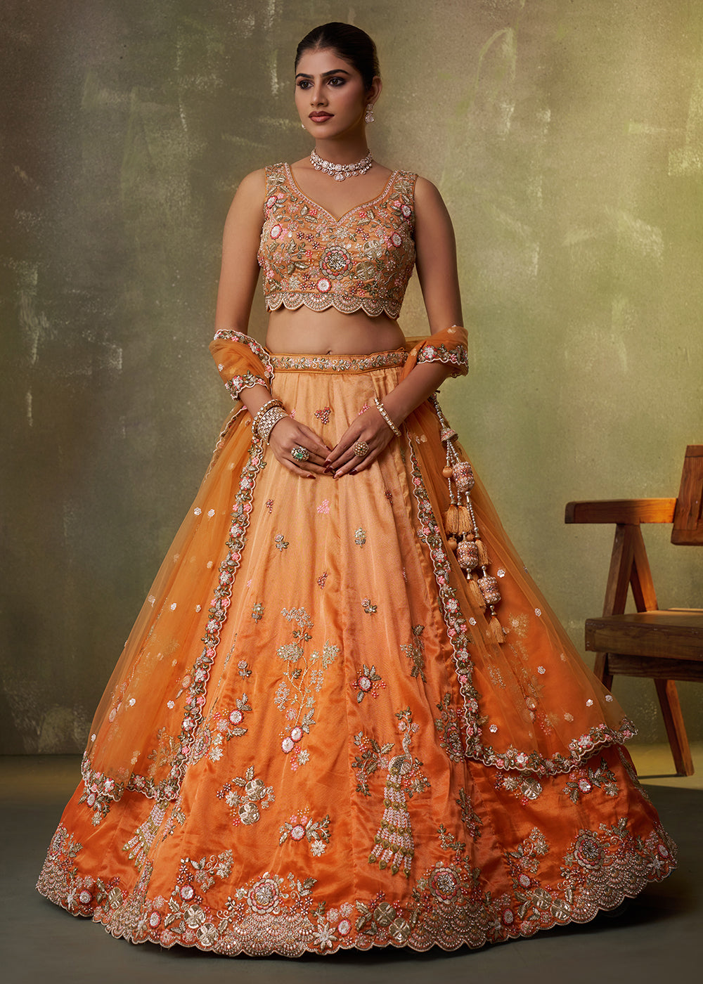 Buy Now Orange Heavy Tissue Pre Wedding Party Lehenga Choli Online in US, UK, Canada, France, Germany, Sweden, Greece, UAE, Denmark & Worldwide at Empress.