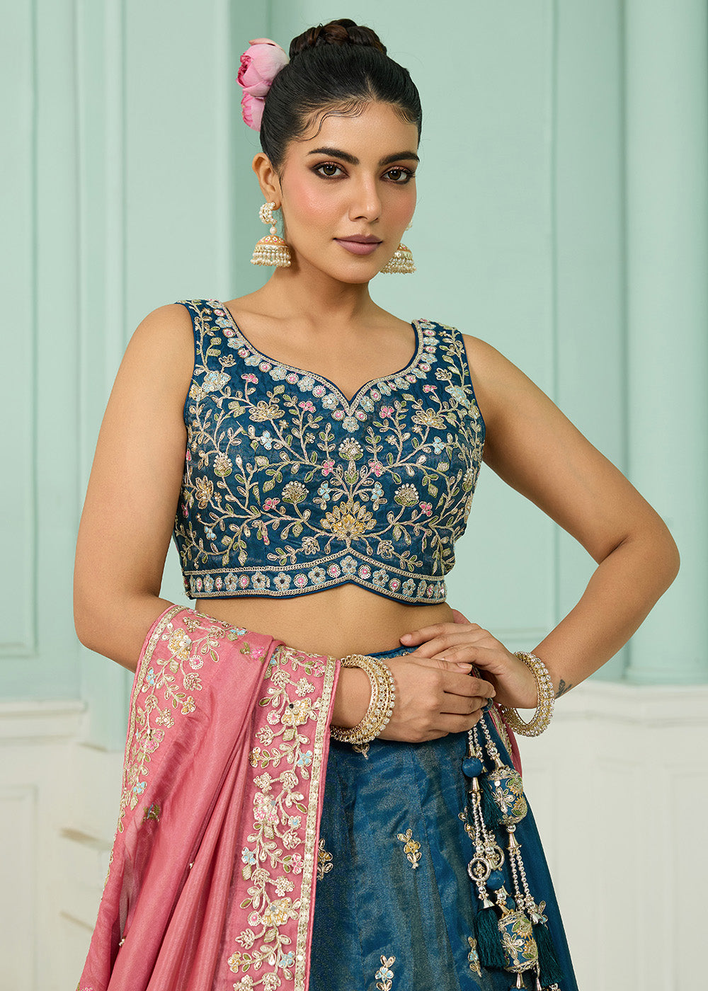 Buy Now Silk Teal Heavy Embroidered Wedding Lehenga Choli Online in US, UK, Canada, France, Italy, Germany, Sweden, Denmark, Greece, UAE & Worldwide at Empress.