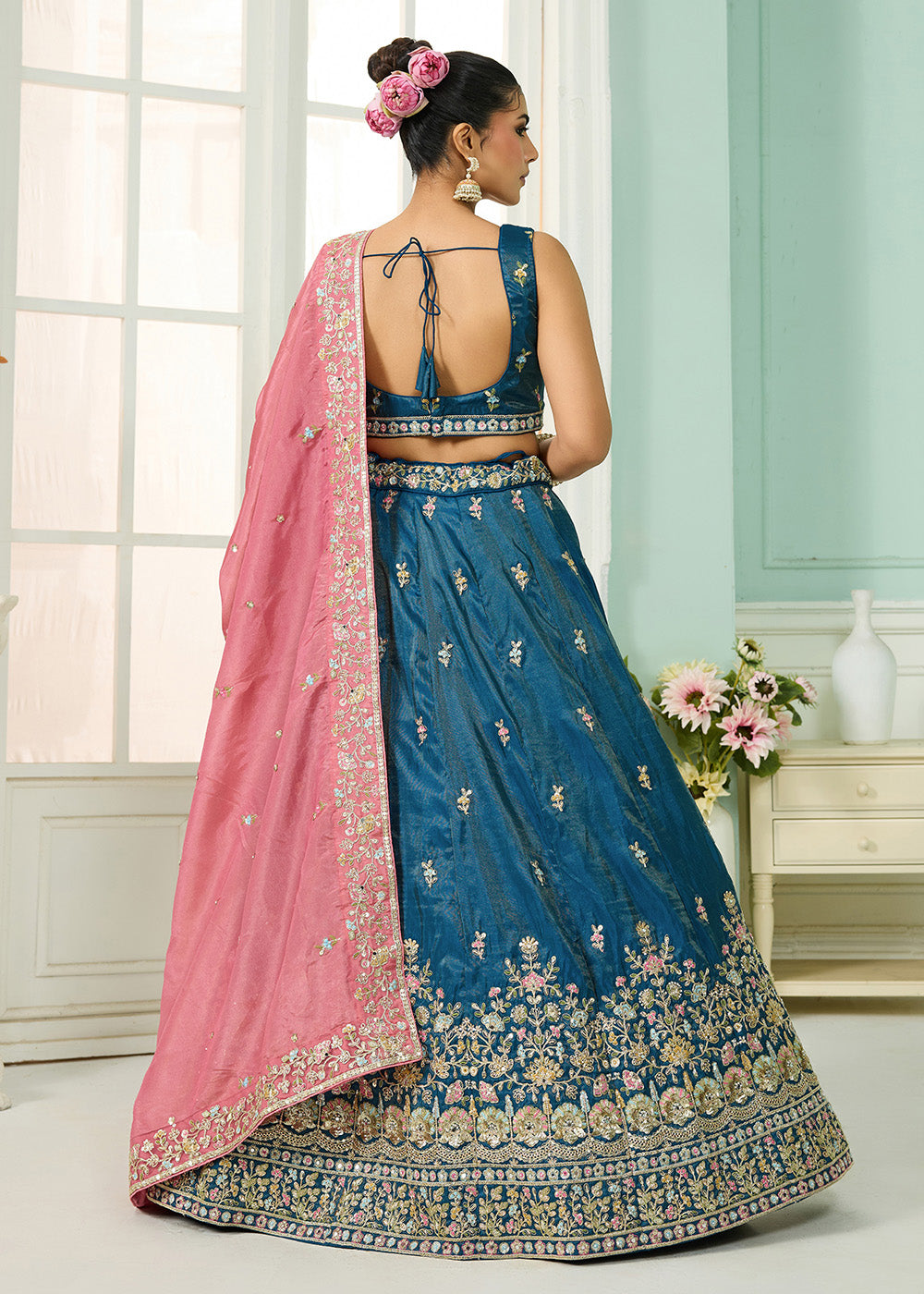 Buy Now Silk Teal Heavy Embroidered Wedding Lehenga Choli Online in US, UK, Canada, France, Italy, Germany, Sweden, Denmark, Greece, UAE & Worldwide at Empress.