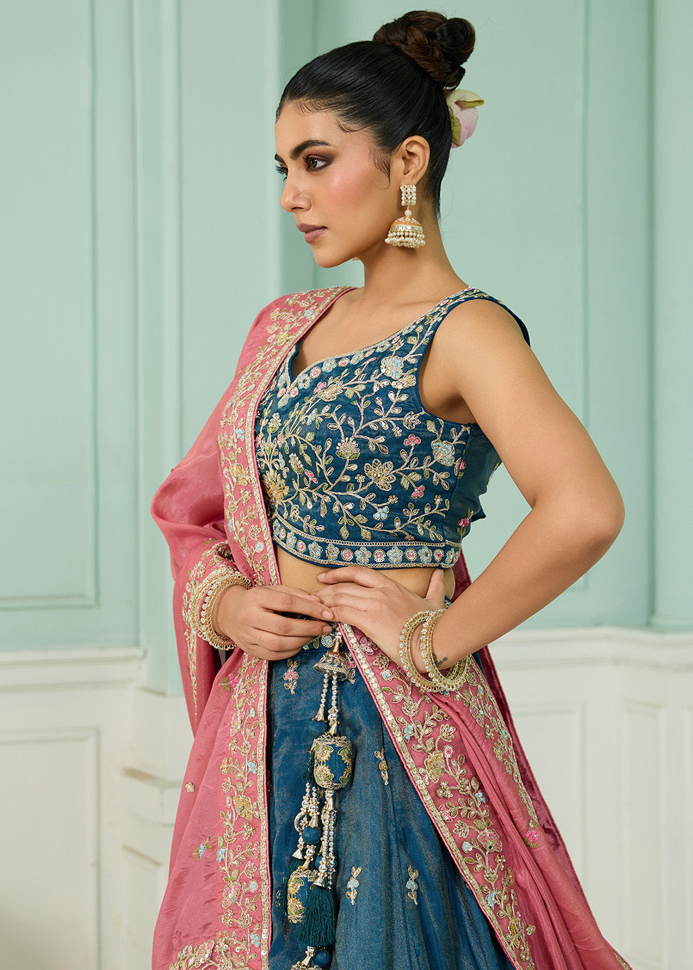 Buy Now Silk Teal Heavy Embroidered Wedding Lehenga Choli Online in US, UK, Canada, France, Italy, Germany, Sweden, Denmark, Greece, UAE & Worldwide at Empress.