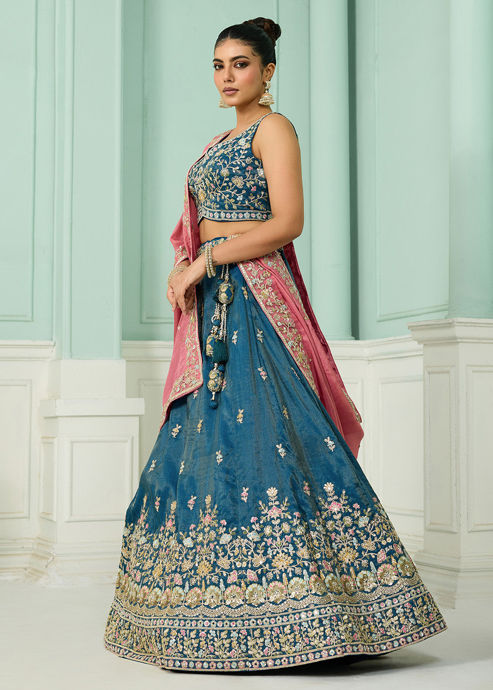 Buy Now Silk Teal Heavy Embroidered Wedding Lehenga Choli Online in US, UK, Canada, France, Italy, Germany, Sweden, Denmark, Greece, UAE & Worldwide at Empress.