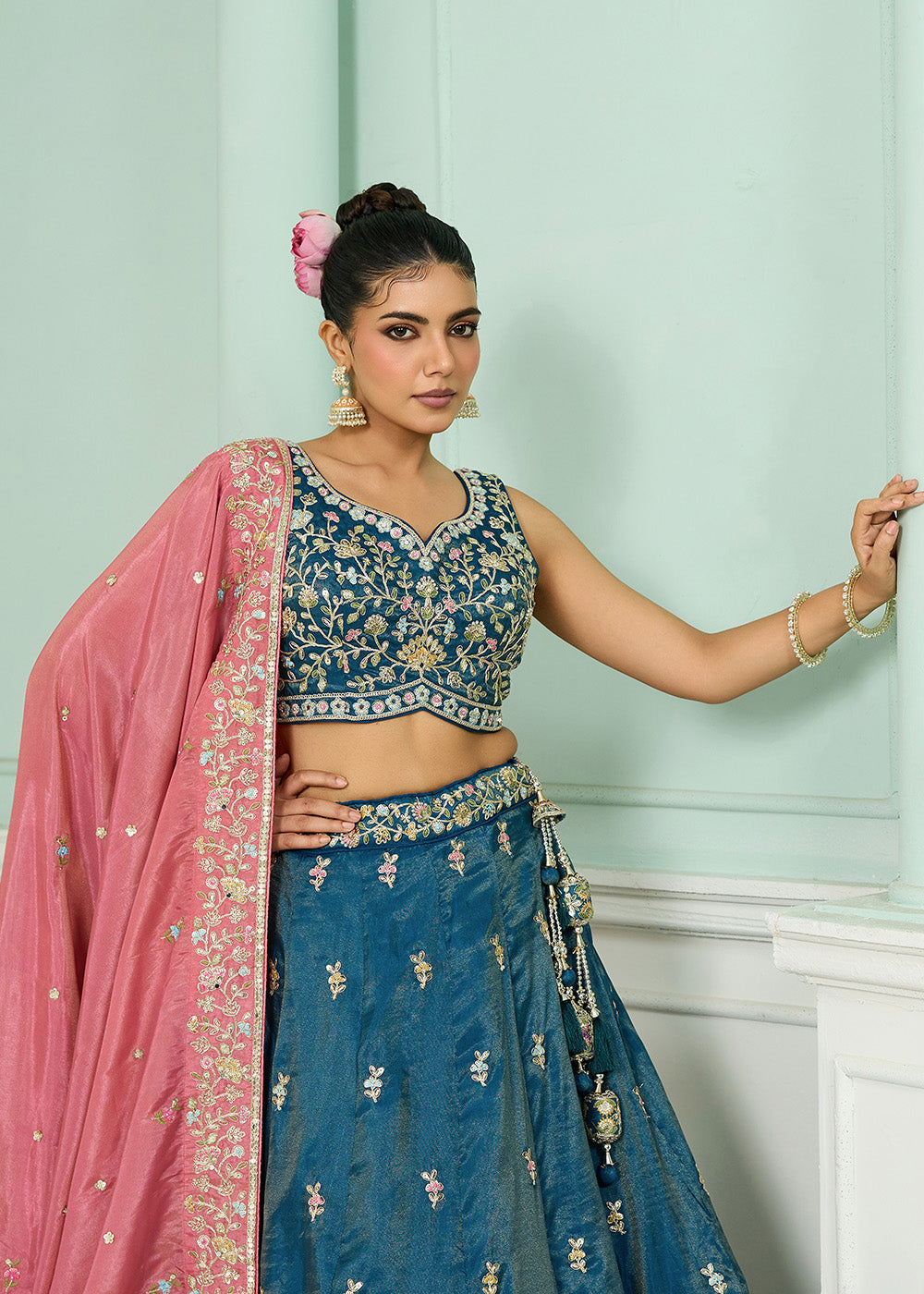 Buy Now Silk Teal Heavy Embroidered Wedding Lehenga Choli Online in US, UK, Canada, France, Italy, Germany, Sweden, Denmark, Greece, UAE & Worldwide at Empress.